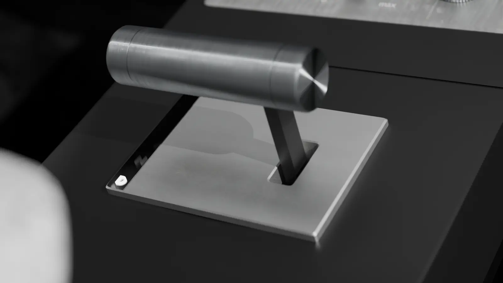 Close-up of the machined aluminium T-handle gear selector in its gate